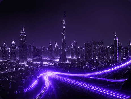Dubai at night with light trails — Buz's home since 2008